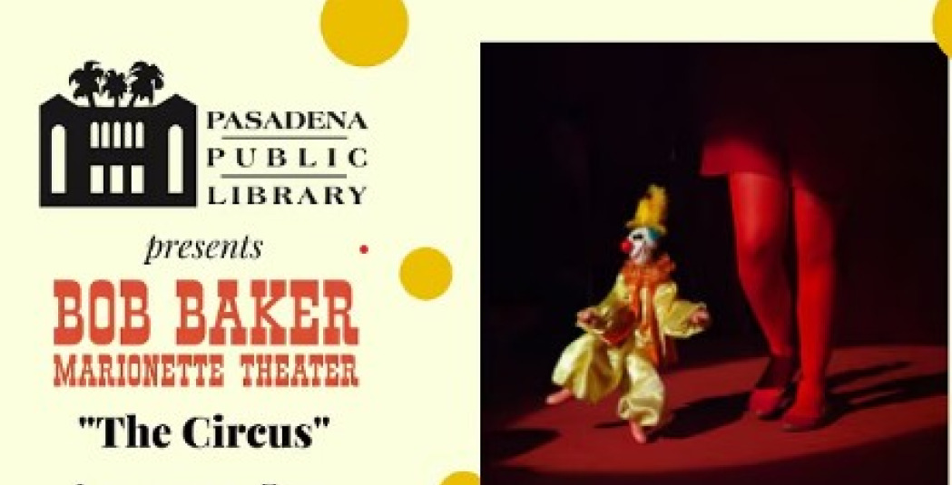 Picture of a man with a marionette onstage