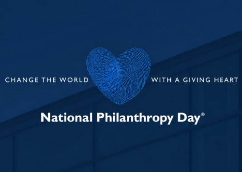 Blue background with a light blue hears saying National Philanthropy Day