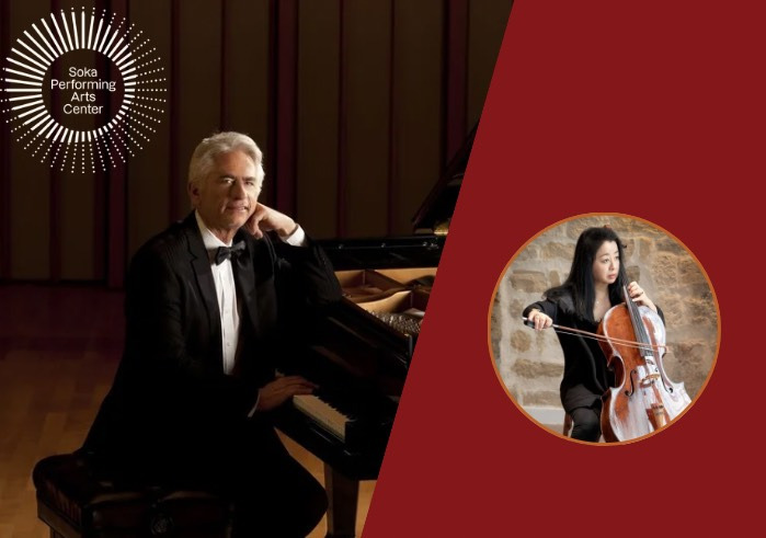 Man in black suit sitting at the piano and woman standing with a cello