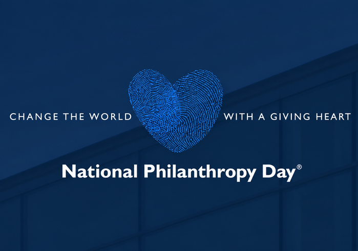 Blue background with a light blue hears saying National Philanthropy Day